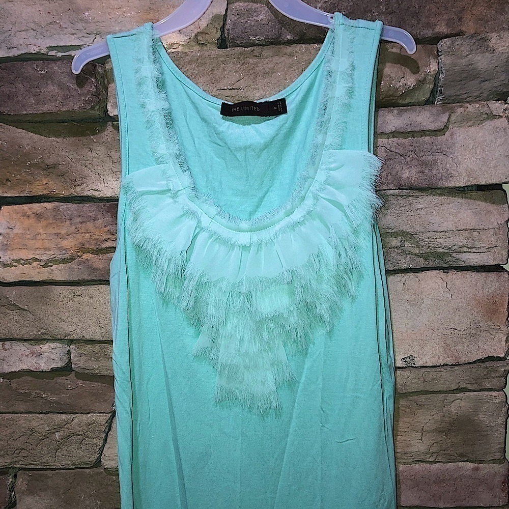 The limited size medium top with ruffle trim